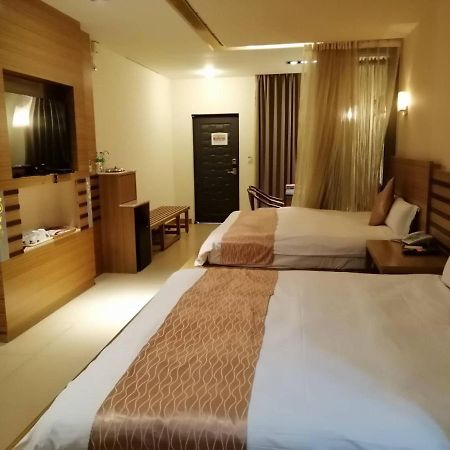 Nikaido Business Hotel Minxiong Eksteriør billede
